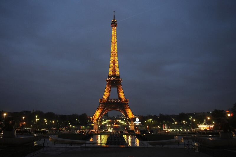 PARIS, FRANCE - MARCH 31:  The Eiffel Tower is seen before the lights are switched off for Earth Hour 2012, on March 31, 2012 in Paris, France. According to organisers the biggest ever Earth Hour has participants including individuals, companies and landmarks in 147 countries and over 5,000 cities, agreeing to switch off their lights for one hour at 8:30pm. The Brandenburg Gate in Berlin, the Eiffel Tower in Paris, Big Ben Clock Tower in London, the Christ the Redeemer statue in Rio de Janeiro and the Empire State Building in New York are among the monuments whose operators have agreed to participate in the demonstration.  (Photo by Antoine Antoniol/Getty Images)