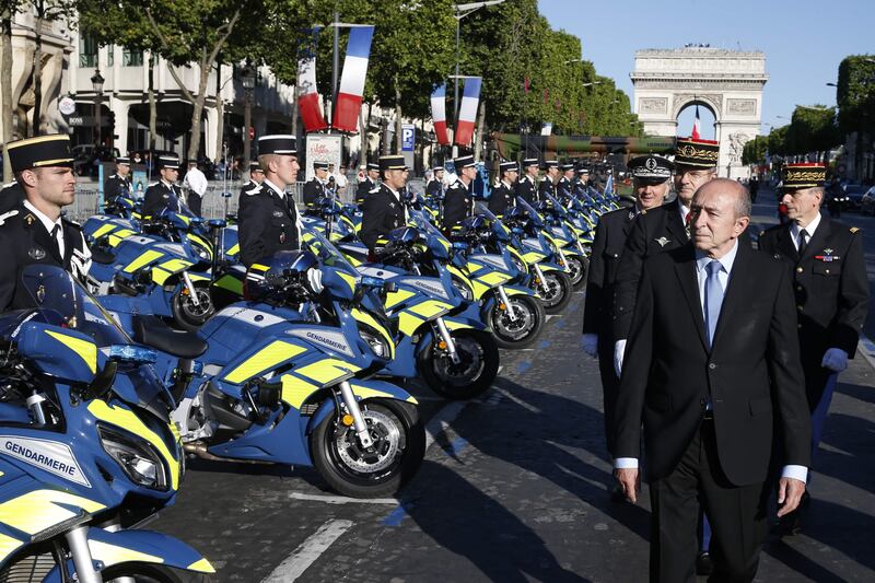 French interior minister Gerard Collomb inspects the French gendarmerie. Geoffrey van der Hasselt / AFP Photo