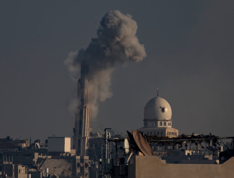 Smoke rises following Israeli air strikes in Khan Younis, the southern Gaza Strip. EPA