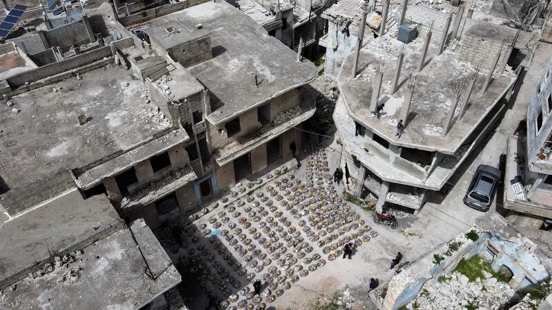 Food packs are arranged in an open area in Al Najieh, which is currently along the front lines between Syrian government forces and rebels. AFP