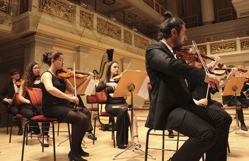 Members of the Syrian Expat Philharmonic Orchestra during a performance at the Concert House in Berlin, September 2016.