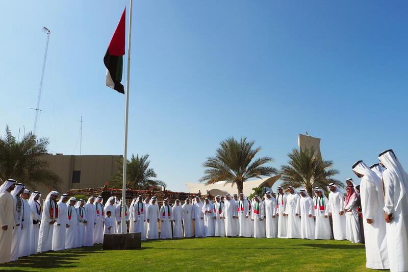 Abu Dhabi Media employees and their families observed a minute of silence for Commemoration Day. Delores Johnson / The National