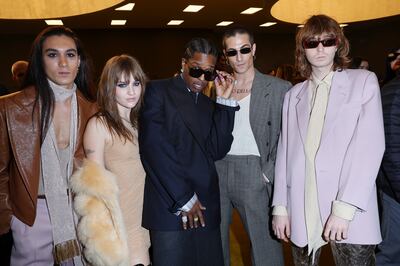 A$AP Rocky, centre, with the four-piece group Maneskin at Gucci's autumn/winter show in Milan. Getty Images