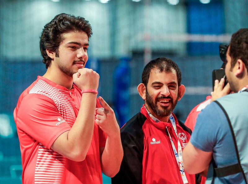 Abu Dhabi, March 17, 2019.  Special Olympics World Games Abu Dhabi 2019. Volleyball match at Adnec.  UAE VS.  USA..--  Mohamad Al Bonni proudly shows his Special Olympics bangle.
Victor Besa/The National