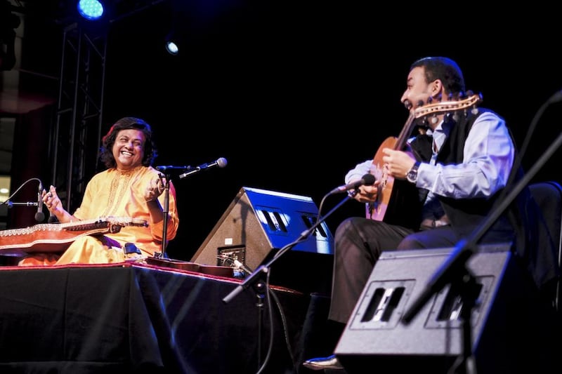 Hindustani slide guitar wizard Pandit Debashish Bhattacharya and Moroccan oud master Driss el Maloumi at NYUAD. Courtesy NYUAD