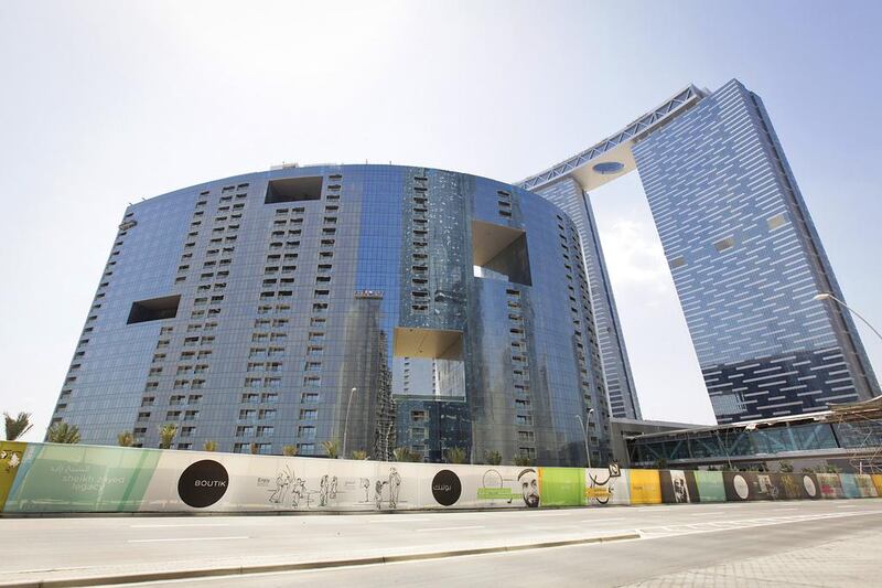 Shams Abu Dhabi, Reem Island apartments: Q2 up 1%. 1BR: Dh95-120,000. 2BR: Dh135-170,000. 3BR: Dh170-200,000. Q2 2013-Q2 2014 up 2%. Micaela Colace for The National