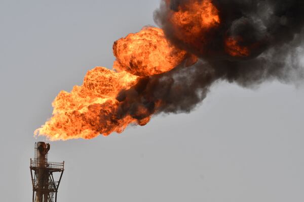 Smoke billows from a gas refinery in Iraq's southern Maysan province. AFP