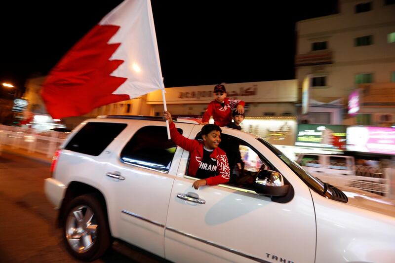 Bahrainis celebrate after winning the Gulf Cup final against Saudi Arabia, in Riffa, south of Manama, Bahrain. Reuters