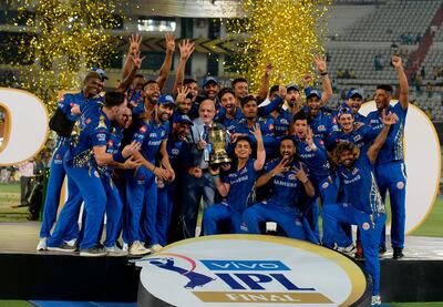 (FILES) In this file photo taken on May 13, 2019 Mumbai Indians team players hold the trophy as they celebrate their victory against Chennai Super Kings after the 2019 Indian Premier League (IPL) Twenty20 final cricket match at the Rajiv Gandhi International Cricket Stadium in Hyderabad. India's cricket board is seeking government approval to hold the Indian Premier League, the world's richest cricket tournament, in the United Arab Emirates from September, its chairman told AFP on July 21. The postponement of the Twenty20 World Cup until 2021 because of the coronavirus pandemic has opened the way for the suspended IPL, which the Board of Control for Cricket in India wants to run from September until early November. - ----IMAGE RESTRICTED TO EDITORIAL USE - STRICTLY NO COMMERCIAL USE----- 
 / AFP / NOAH SEELAM / ----IMAGE RESTRICTED TO EDITORIAL USE - STRICTLY NO COMMERCIAL USE----- 
