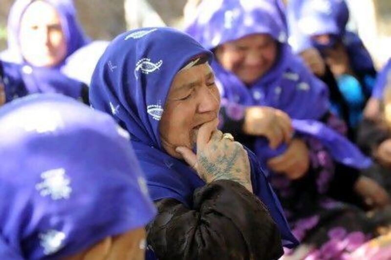 Local women mourn the five Turkish family members killed by a mortar bomb in the southern border town of Akcakale.