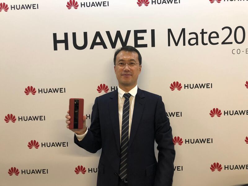 Kevin Ho, president of the handset product line at Huawei consumer business group, is sure of increasing global market share. Alkesh Sharma / The National