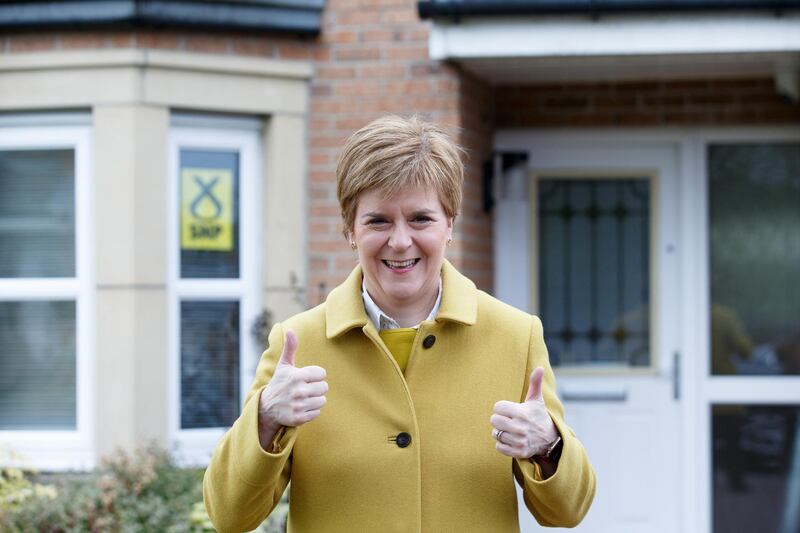 Scottish First Minister and leader of the Scottish National Party Nicola Sturgeon leaves her house at the start of polling day in Glasgow, Scotland. EPA