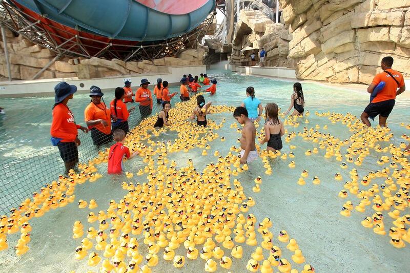 More than 2,000 thousand rubber ducks race for charity raising over Dh60,000 for the Make-A-Wish UAE Foundation at Yas Waterworld in Abu Dhabi. Ravindranath K / The National