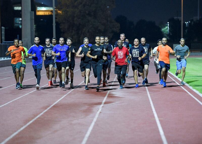 Abu Dhabi Running Team-AD Youssef Rochdi, 37, founder and coach of Abu Dhabi Running Team, free-of-charge running programme that started a week after Covid-19 regulations kicked in last year. It now has over 2,000 members encouraging people of all ages to run at Zayed Sports complex in Abu Dhabi on June 2, 2021. Khushnum Bhandari / The National 
Reporter: Haneen Dajani News