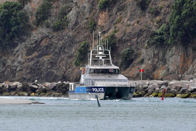 The police boat Deodar III arrives into Whakatane after police were unable to get onto White Island to recover the bodies of those killed by the December 9 volcanic erutpion, in Whakatane. AFP