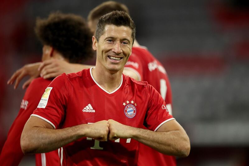 Robert Lewandowski  celebrates adding Bayern's third goal before half time, Getty