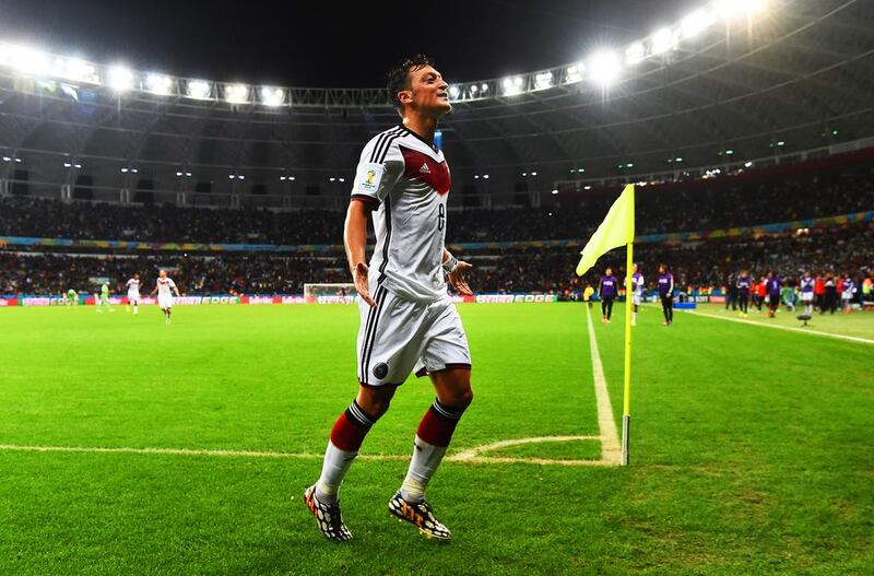 Even with the successes Germany has had on the pitch, midfielder Mesut Ozil has bore the brunt of criticism for what some people say is a disinterested or lazy attitude. Patrik Stollarz / AFP 