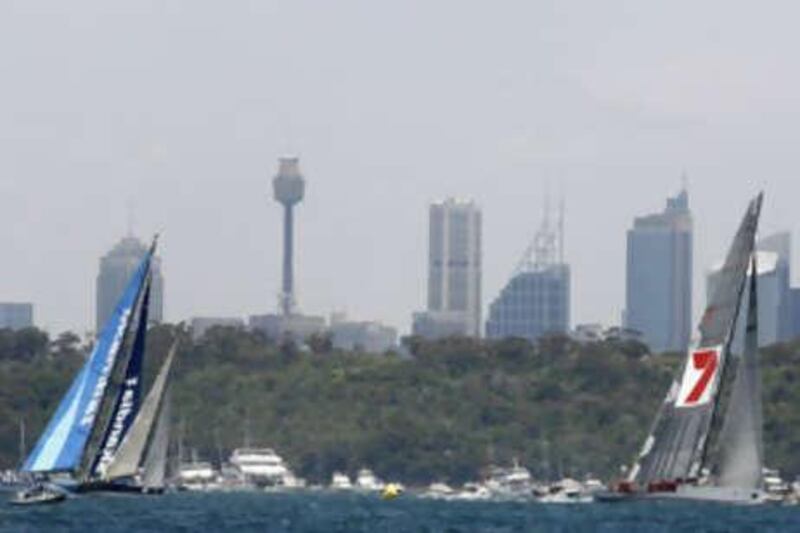 Australian supermaxi yacht Wild Oats XI (R) leads ahead Skandia at the start of the annual Sydney to Hobart yacht race.
