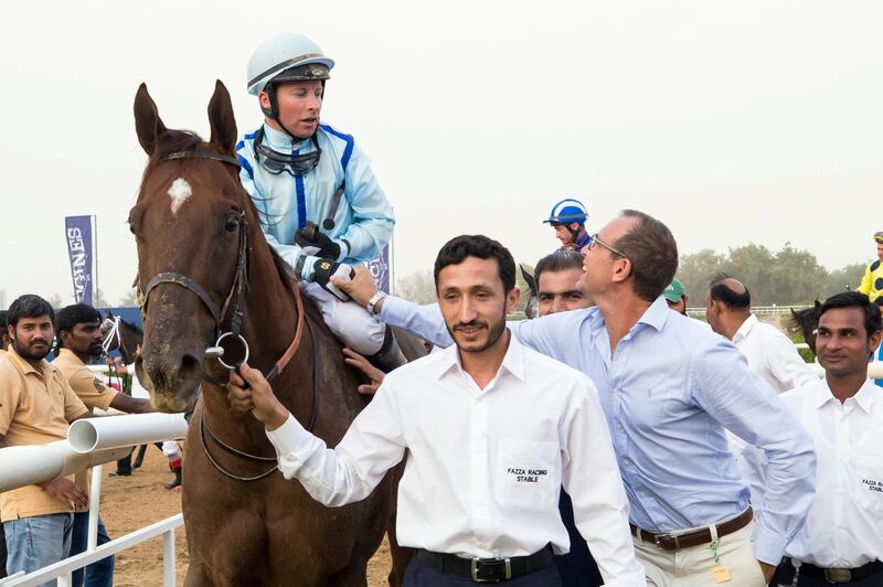 09.11.19. Sharjah. Race 5  Philosopher - trainer  Salem bin Ghadayer (assistant Andrea Mascolo congratulating) - jockey  Tadhg O'Shea - Erika Rasmussen