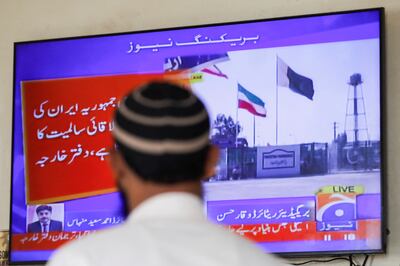 A television screen in Karachi after the Pakistani foreign ministry said the country carried out strikes inside Iran. Reuters