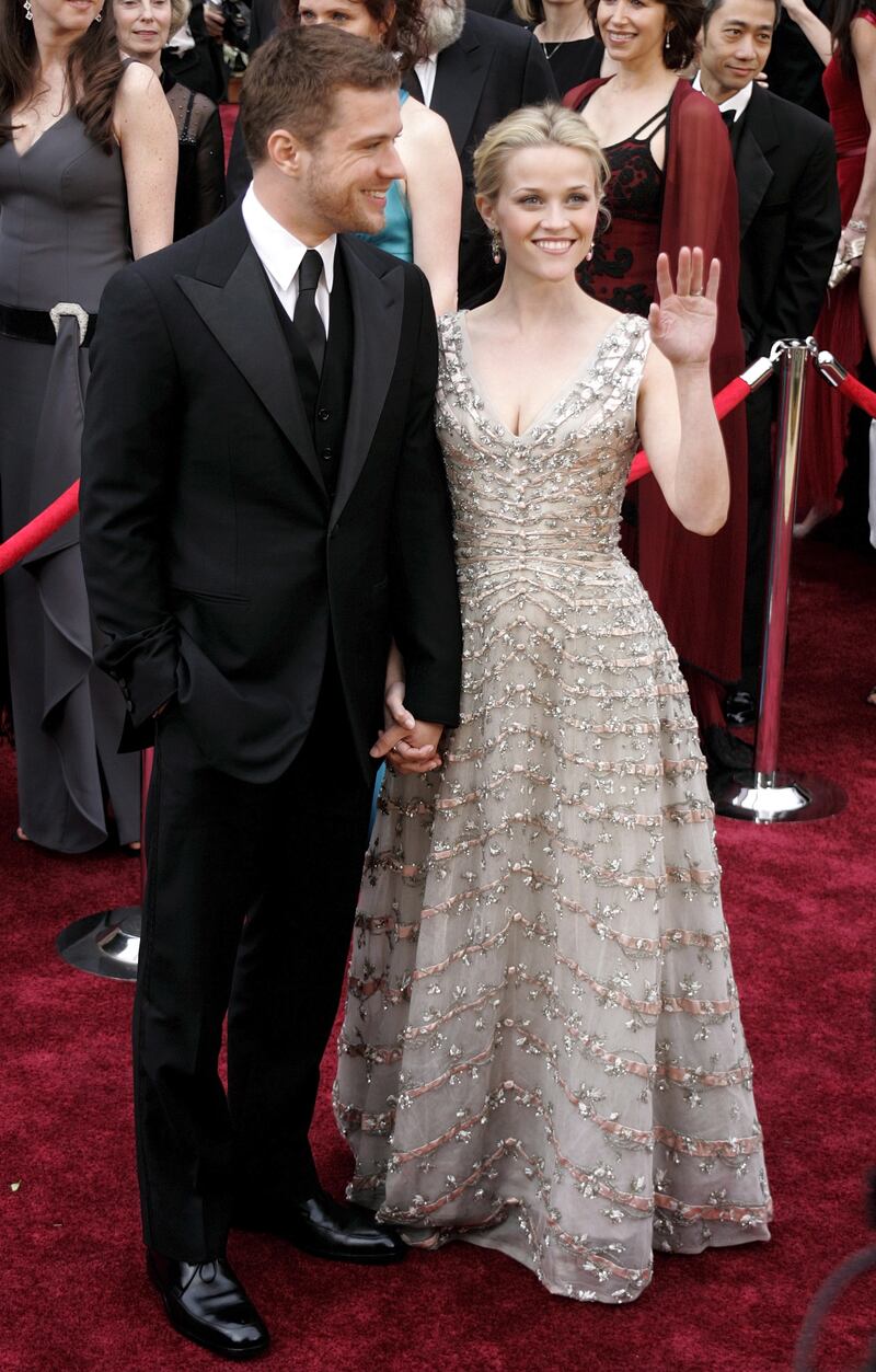 epa00660689 Actress Reese Witherspoon (R), with her husband Ryan Philipp on the red carpet during the 78th annual Academy Awards in Hollywood,  California, Sunday 05 March 2006.  EPA/ARMANDO ARORIZO