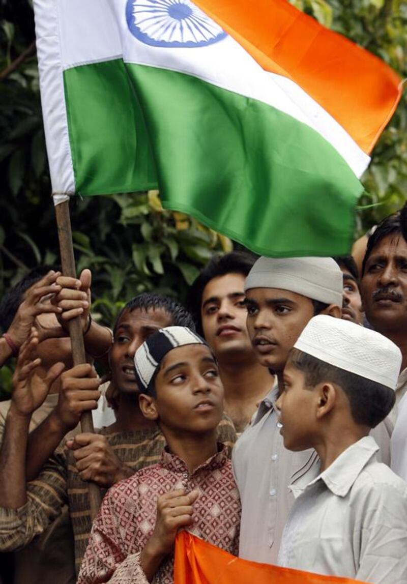 Indian Muslims at a demonstration In Kolkata during which youths sang Vande Mataram, an Indian national song. The BJP, the main opposition Hindu nationalist party, has ordered compulsory singing of the anthem in some schools, angering Muslims opposed to the song, which worships India as a goddess. Deshakalyan Chowdhury / AFP

