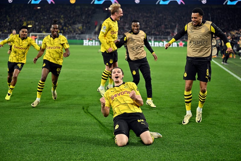Marcel Sabitzer celebrates after scoring Borussia Dortmund's fourth goal during the Champions League quarter-final second leg match against Atletico Madrid at the Signal-Iduna Park in Dortmund, Germany, on Tuesday, April 16, 2024. AP