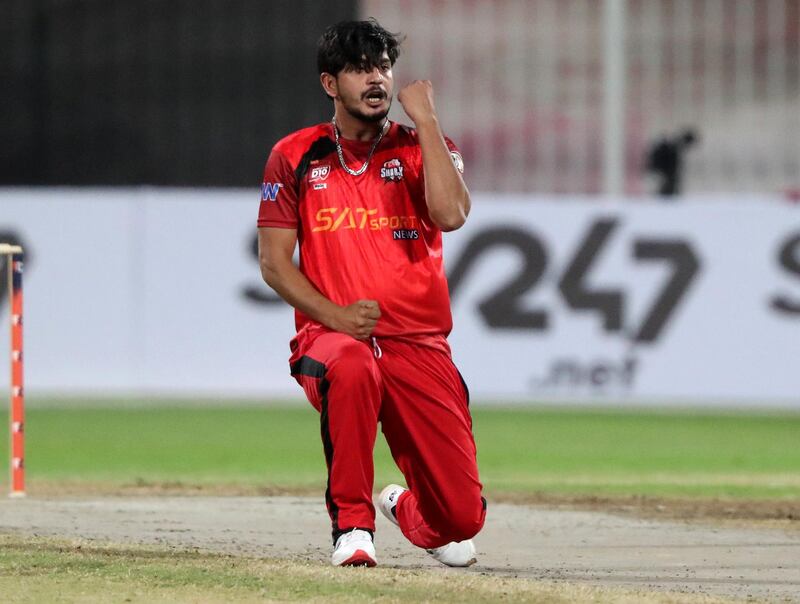 Sharjah, United Arab Emirates - Reporter: Paul Radley. Sport. Cricket. Sharjah's Hafeez Rahman takes the wicket of Fujairah's Waseem Muhammad. The second season of the Emirates D10, Fujairah v Sharjah. Wednesday, March 24th, 2021. Sharjah. Chris Whiteoak / The National