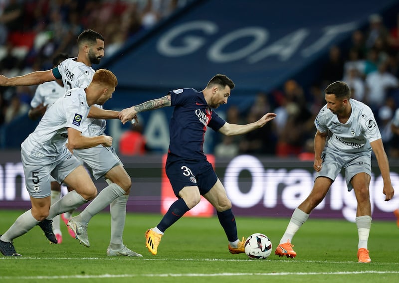 PSG's Lionel Messi surrounded by Clermont players. Reuters