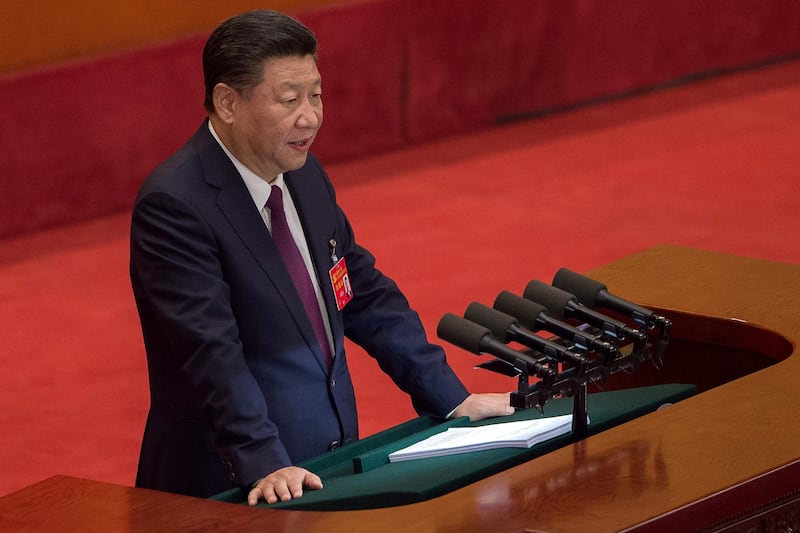 China's President Xi Jinping gives a speech at the opening session of the Chinese Communist Party's five-yearly Congress at the Great Hall of the People in Beijing on October 18, 2017.
President Xi Jinping declared China is entering a "new era" of challenges and opportunities on October 18 as he opened a Communist Party congress expected to enhance his already formidable power. / AFP PHOTO / Nicolas ASFOURI