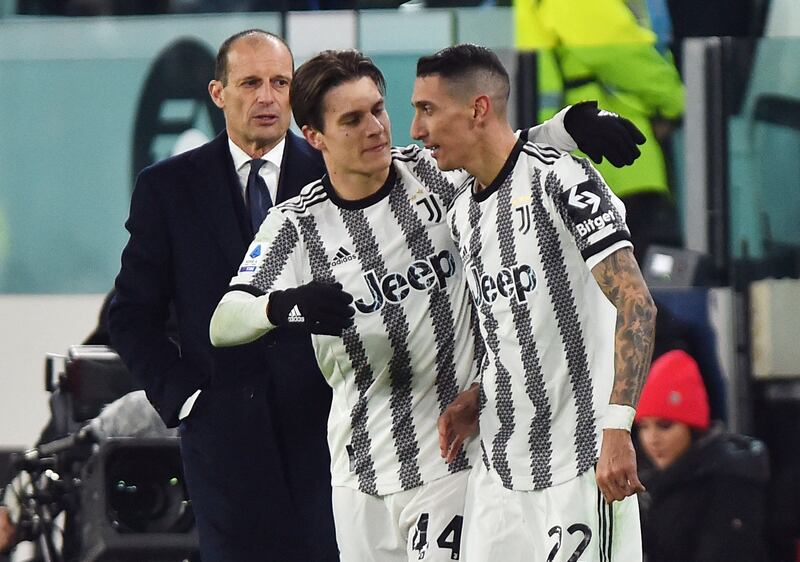 Juventus' Angel Di Maria celebrates with Nicolo Fagioli after scoring against Atalanta as coach Massimiliano Allegri looks on. Reuters