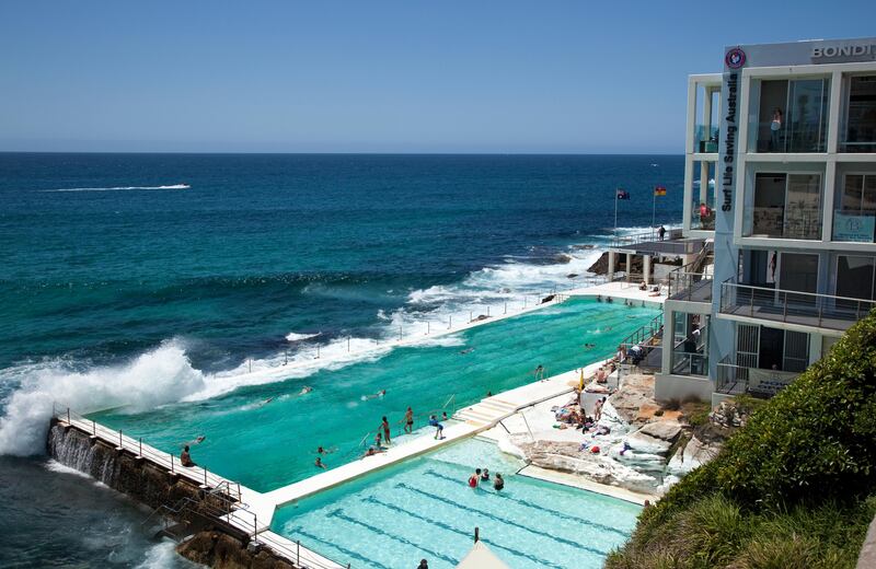 SYDNEY NSW, AUSTRALIA. 05 January 2010.  The Bondi Icebergs club which features a swimming pool right on the sea at the southern end of  Australia's most famous attraction, Bondi Beach. With summer in full swing the beaches of Sydney fill up with tourists and locals alike. As Australia's largest city , Sydney has some of the most beautiful beaches in the world to compliment the incredible Harbour the city is based around. 
