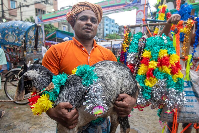 Rain won't spoil the festivities in Dhaka, Bangladesh. EPA