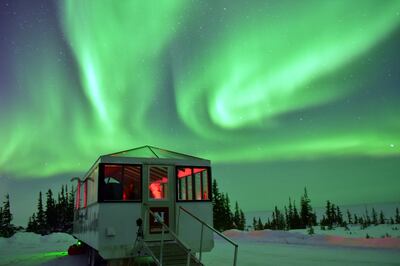 Northern lights dance over the Aurora Pod by Lindblad Expeditions in Churchill, Canada. Photo: Lindblad Expeditions
