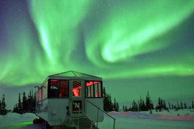 Northern lights dance over the Aurora Pod by Lindblad Expeditions in Churchill, Canada. Photo: Lindblad Expeditions