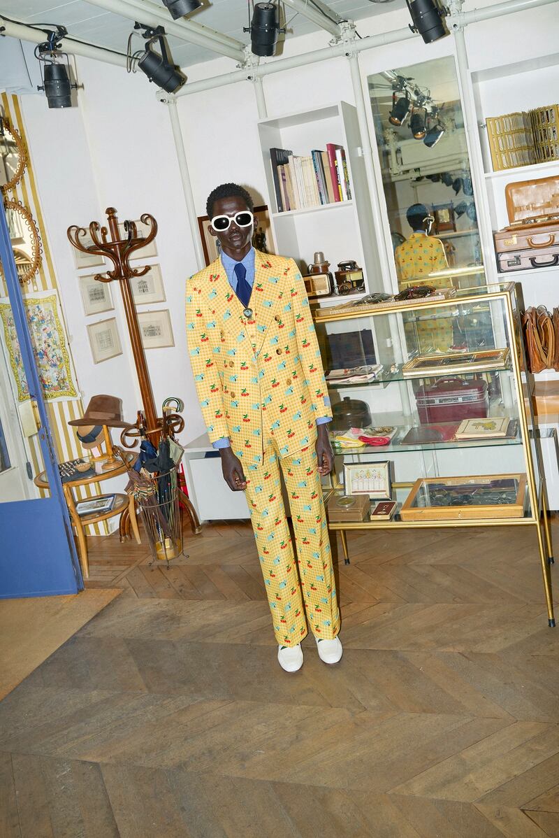 A yellow suit patterned in lambs, part of the Ha Ha Ha collection.