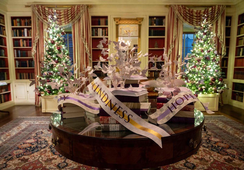 "Inspired by the acts of kindness and experiences that lifted our spirits this year, decorated rooms in the White House reflect the Gifts from the Heart that unite us all: faith, family, friendship, the arts, learning, nature, gratitude, service, community, peace, and unity," the first lady wrote. AFP