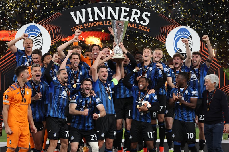 Atalanta celebrate with the Europa League trophy after victory in the final against Bayer Leverkusen at Dublin Arena on May 22, 2024 in Dublin, Ireland. Getty Images