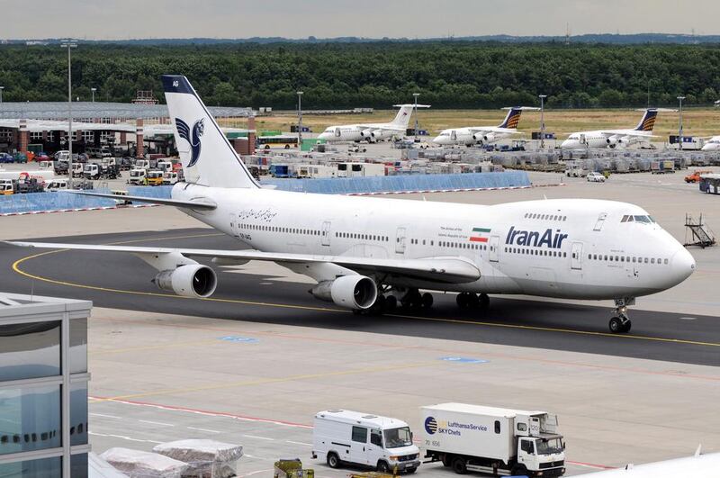 Above, an Iran Air Boeing 747 aircraft taxiing at Frankfurt airport in 2008. The carrier had finalised a contract to buy 80 planes from US firm Boeing. Mauritz Antin / EPA