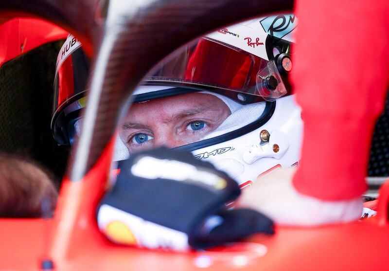 epa07712706 German Formula One driver Sebastian Vettel of Scuderia Ferrari in the team garage during the second practice session of the Formula One Grand Prix of Great Britain at the Silverstone circuit, in Northamptonshire, Britain, 12 July 2019. The 2018 Formula One Grand Prix of Great Britain will take place on 14 July.  EPA/GEOFF CADDICK