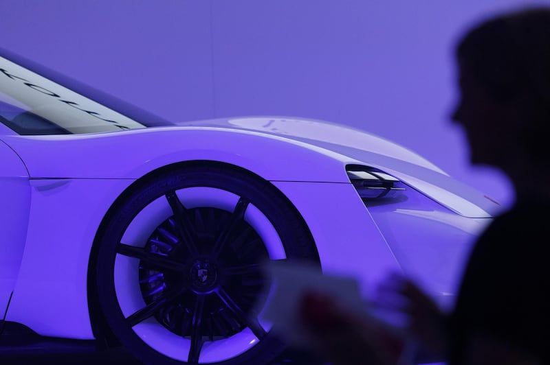 A Porsche AG Taycan electric automobile sits on display as the luxury automaker celebrates its 70th anniversary in Stuttgart, Germany, on Friday, June 8, 2018. Porsche AG named its first car to directly compete with electric leader Tesla Inc. the Taycan, as the German manufacturer gears up for what will arguably be its most ambitious and potentially risky vehicle project ever. Photographer: Alex Kraus/Bloomberg