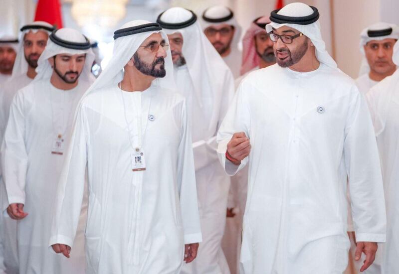 Sheikh Mohammed bin Rashid and Sheikh Mohamed bin Zayed talk as they attend discussions in Abu Dhabi. Dubai Media Office