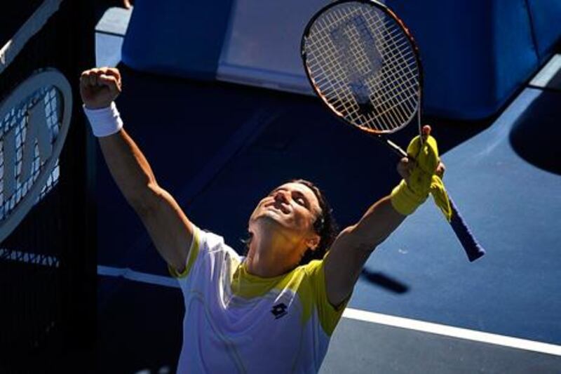 David Ferrer celebrates after winning his quarter final against countryman Nicola Almagro at the Australian Open.