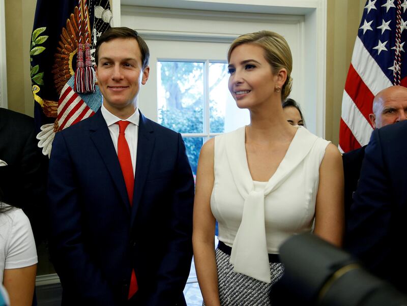 White House Senior Adviser Jared Kushner and Ivanka Trump stand together after John Kelly was sworn in as White House Chief of Staff in the Oval Office of the White House in Washington, U.S., July 31, 2017. REUTERS/Joshua Roberts     TPX IMAGES OF THE DAY