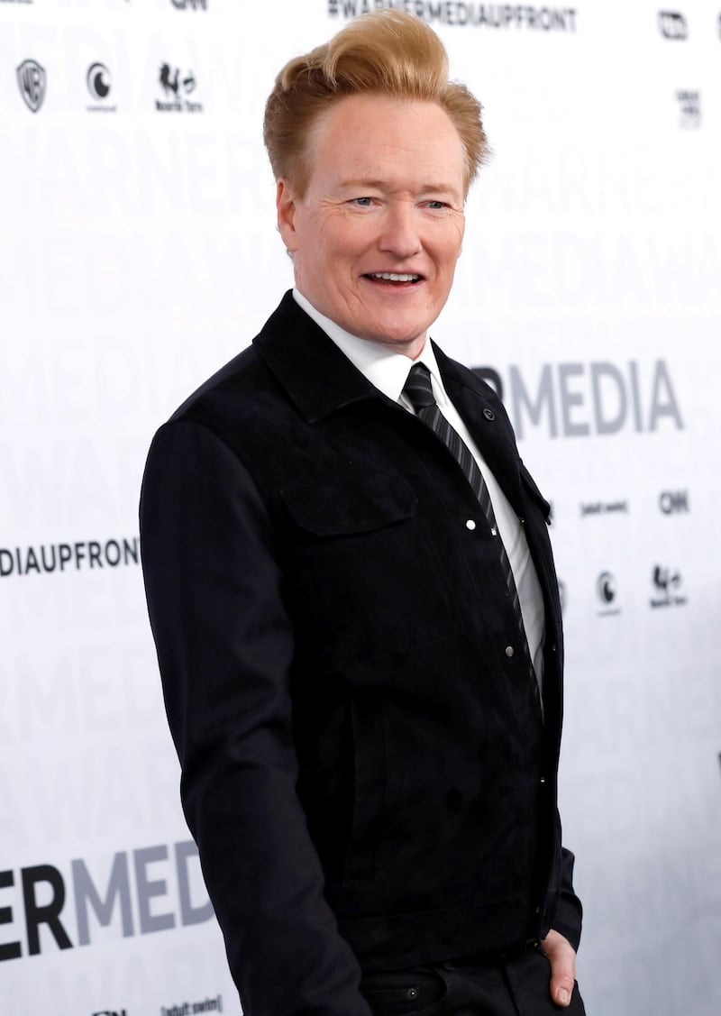FILE PHOTO: Comedian Conan O'Brien poses as he arrives at the WarnerMedia Upfront event in New York City, New York, U.S., May 15, 2019. REUTERS/Mike Segar/File Photo