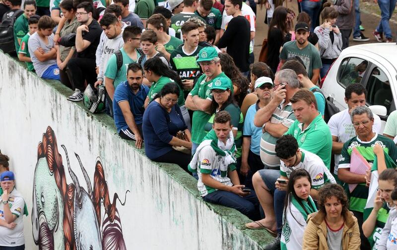 Fans of Chapecoense football team are pictured in front of the Arena Conda stadium in Chapeco, Brazil. Paulo Whitaker / Reuters