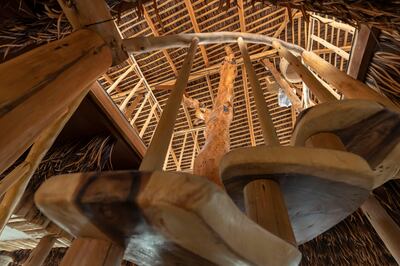 A wooden staircase that circles a large ghaf tree is certain to be a talking point.