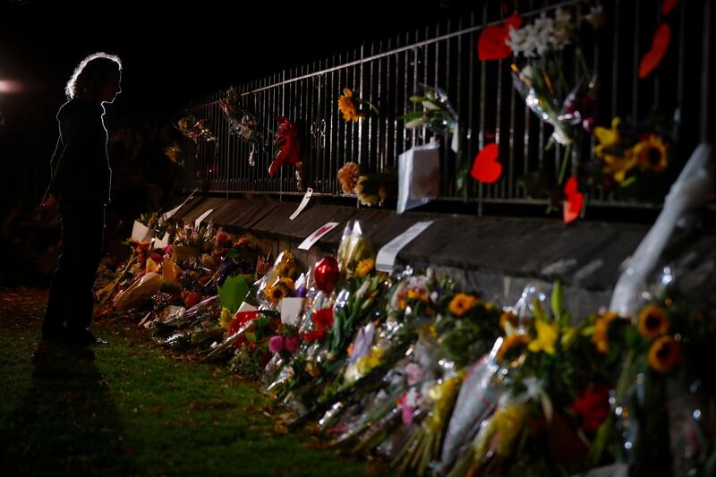 Mourners pay their respects at a makeshift memorial near the Al Noor mosque in Christchurch, New Zealand. AP