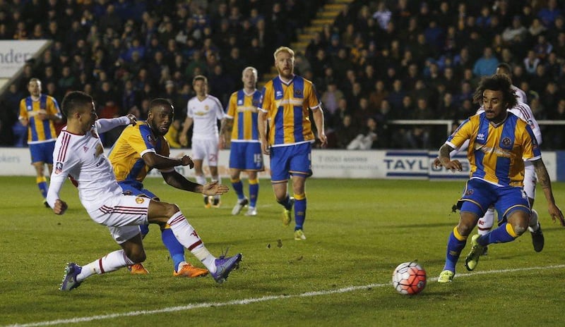 Football Soccer - Shrewsbury Town v Manchester United - FA Cup Fifth Round - Greenhous Meadow - 22/2/16Manchester United's Jesse Lingard scores their third goalReuters / Andrew YatesLivepicEDITORIAL USE ONLY. No use with unauthorized audio, video, data, fixture lists, club/league logos or "live" services. Online in-match use limited to 45 images, no video emulation. No use in betting, games or single club/league/player publications.  Please contact your account representative for further details.