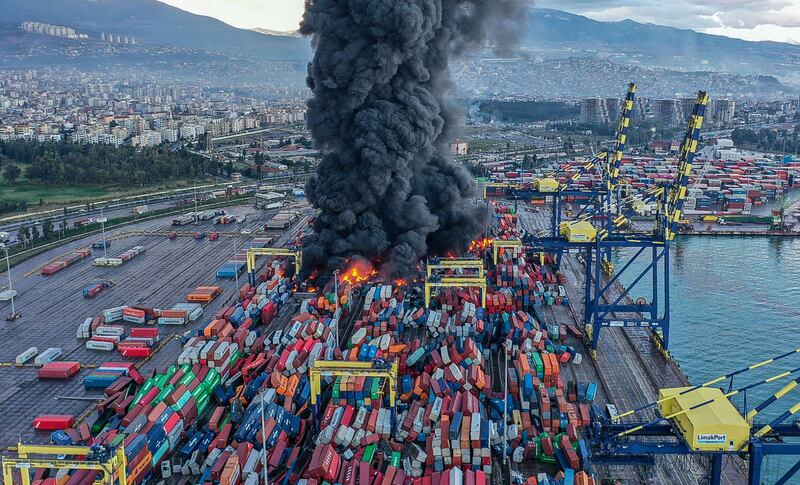 Burning containers in Iskenderun, Hatay, a day after a 7.8-magnitude earthquake struck south-east Turkey. AFP

